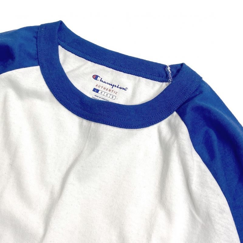 blue and white champion shirt